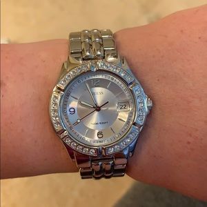 Guess silver tone rhinestone watch.
